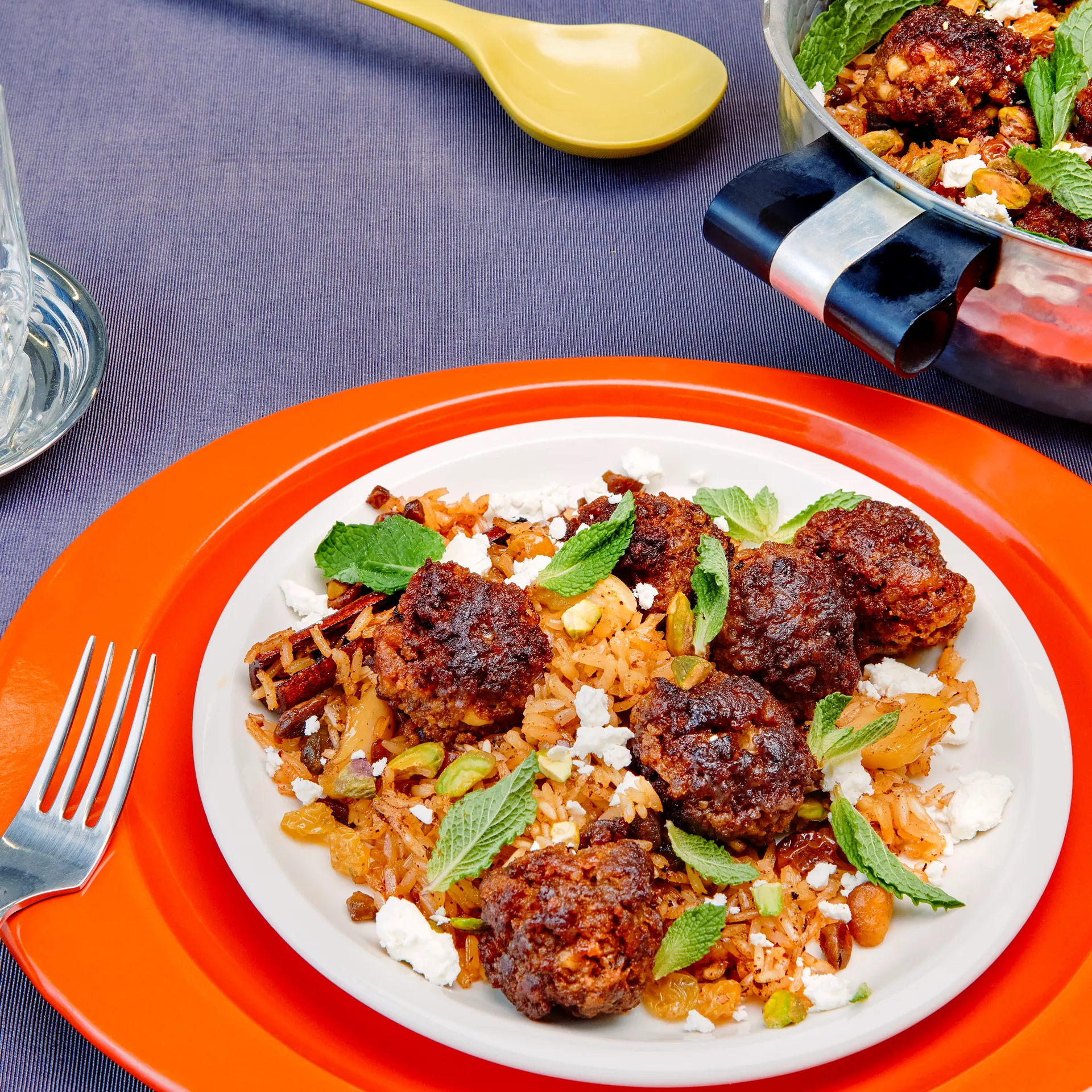Cover for Spiced Meatballs With Golden Raisin–Pistachio Pilaf
